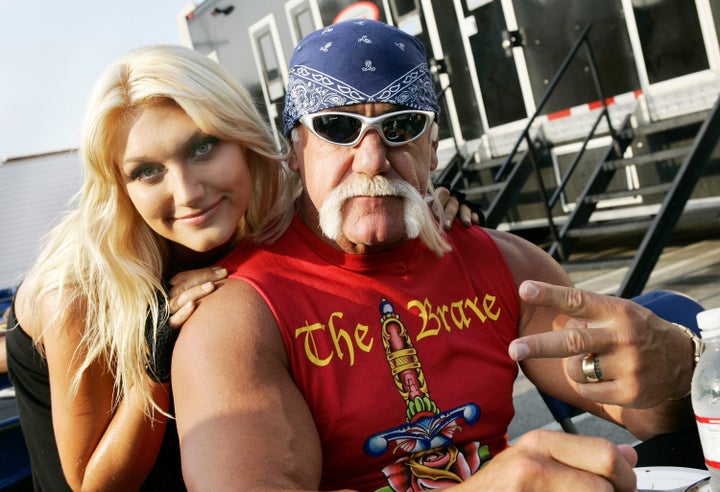 Hulk Hogan poses with daughter Brooke Hogan on the set of a music video shoot in 2006.